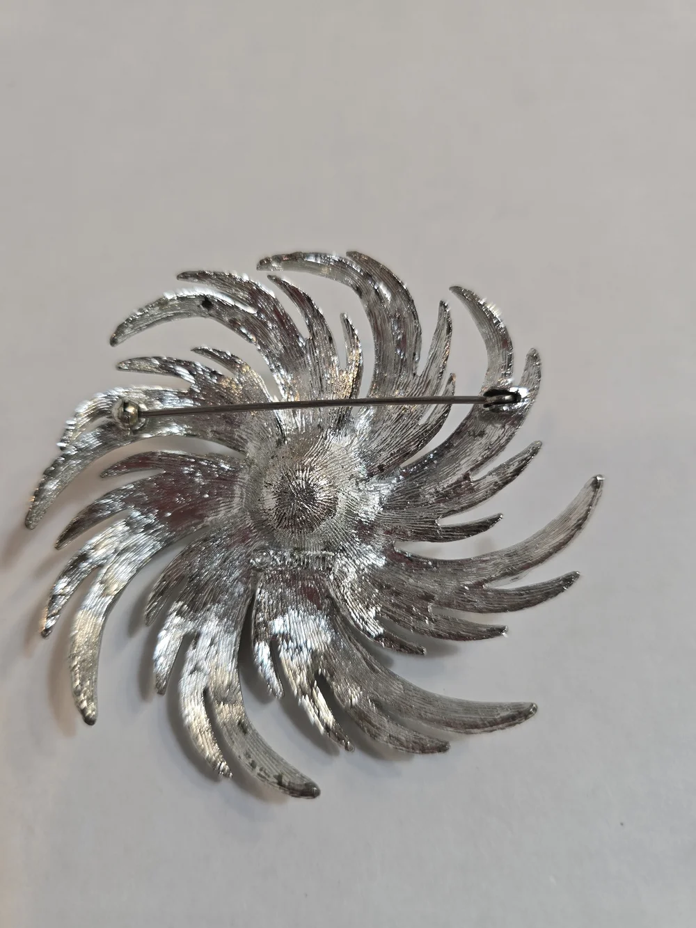Sarah Coventry Silver-tone Swirl Brooch with Pearl Center